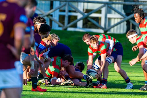 Millfield rugby players contesting the ball at a ruck