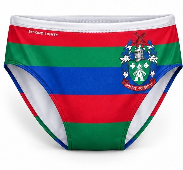 Beyond Eighty Millfield swim brief in red, green and blue stripes with the Millfield crest, front view
